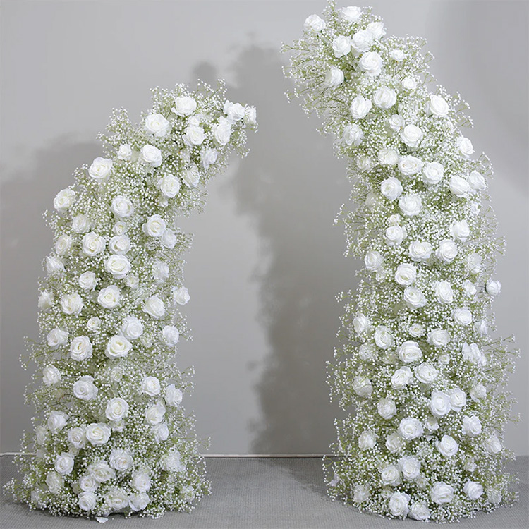 white floral archway with baby breathe